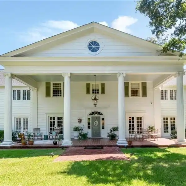 SUN-FILLED COLONIAL WITH EXPANSIVE KITCHEN