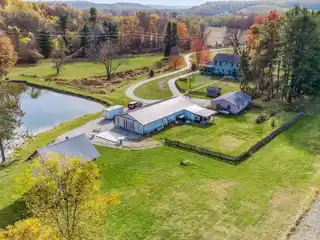Unique Estate of Natural Beauty with Private Pond and Barn