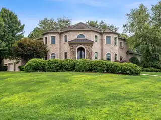 Beautifully Crafted Custom Home Located on a Large Corner Lot