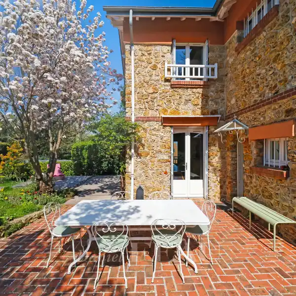 LIGHT-FILLED FAMILY HOME WITH TIMELESS CHARM