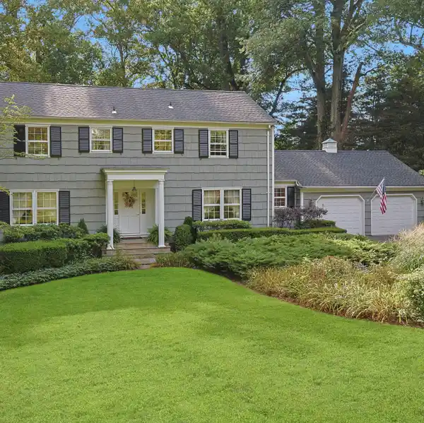 IMMACULATE COLONIAL IN THE RIVER ROAD ENCLAVE