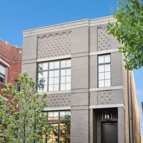 MASTERFULLY CRAFTED RESIDENCE ON A COVETED STREET