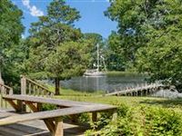 EXPANDED SIX BEDROOM HOME ON NAVIGABLE WEST NECK CREEK