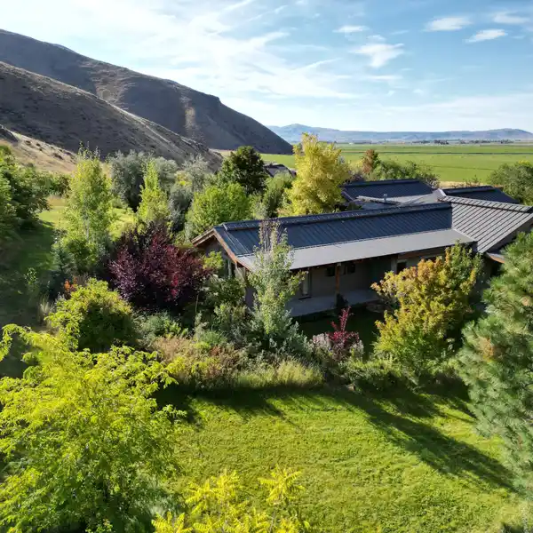 MASTERFULLY DESIGNED HOME WITH A UNRIVALED LANDSCAPE