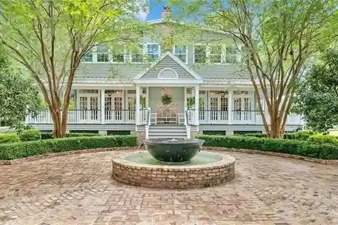 Craftsmanship and Charm on Expansive Oak-Spotted Estate