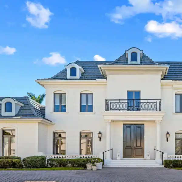 EXQUISITE CUSTOM HOME NESTLED IN THE HEART OF BOCA GROVE PLANTATION