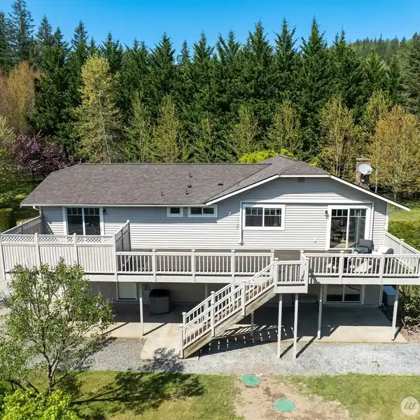 METICULOUSLY MAINTAINED HOME ON 1.3 PEACEFUL ACRES