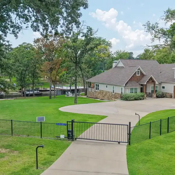 LAKESIDE LUXURY IN PRIVATE GATED ESTATE