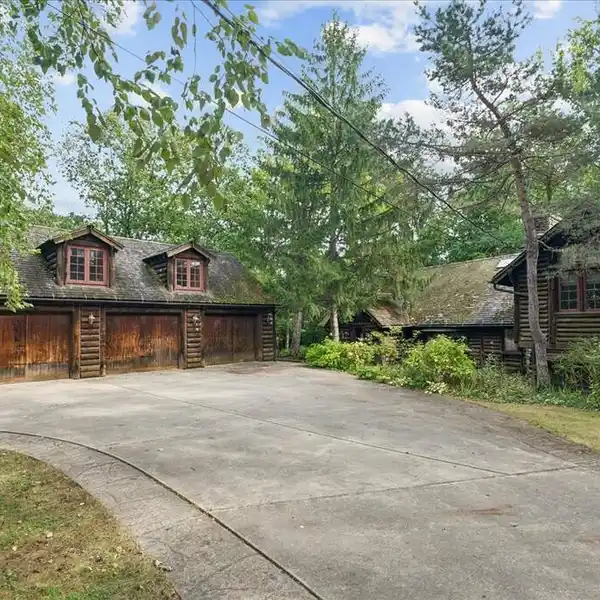 UNIQUE LOG CABIN ON WOODED PROPERTY
