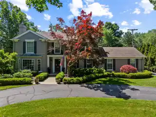Designer Renovation with Rare Half-Acre Lot