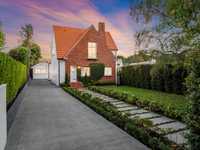STYLISHLY RENOVATED ENGLISH BRICK HOME