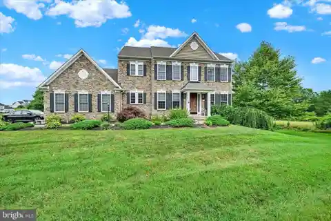 Stunning Stone Colonial with Open-Concept Living