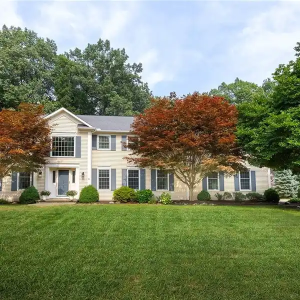 MODERN LUXURY MEETS SERENE ACRE LOT