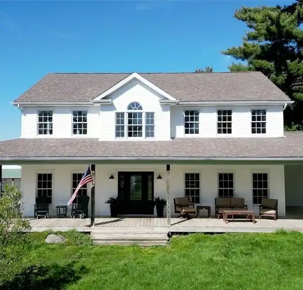 UPDATED COLONIAL-STYLE HOME ON NEARLY 50 ACRES