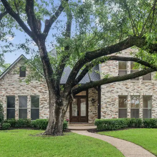 CUSTOM HOME ON A GENEROUS CORNER LOT