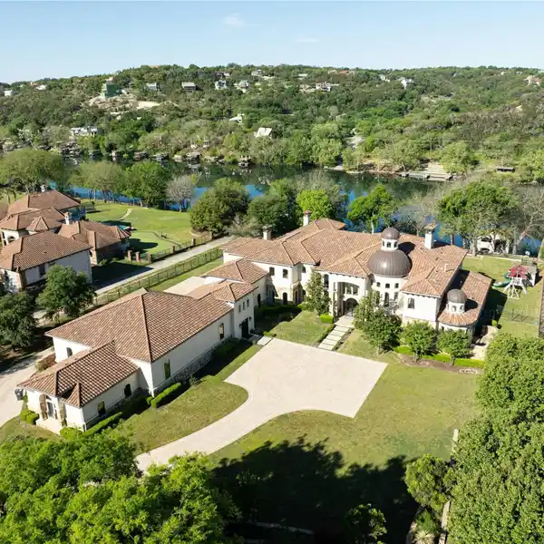 ELEGANT LAKEFRONT RETREAT WITH PRIVATE DOCK