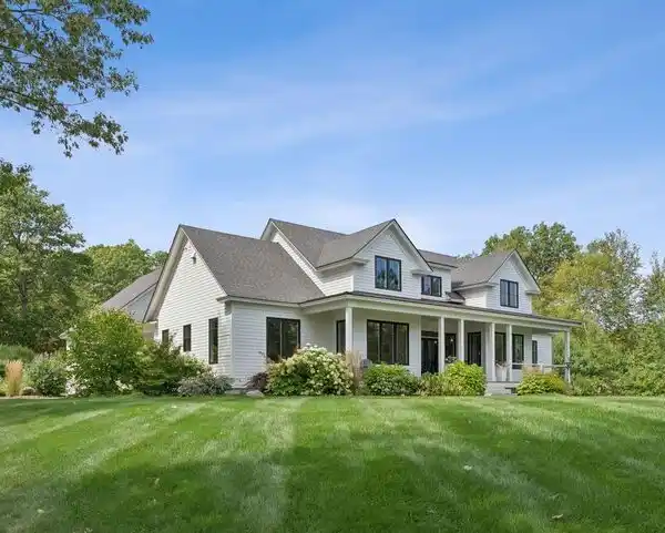 EXCEPTIONAL EXTENDED CAPE COD STYLE HOME