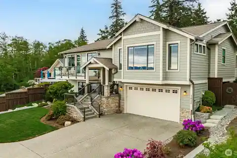 Elegant Home with Front-Row Water Views