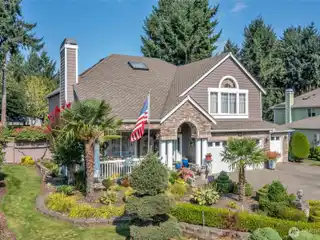 Stone-Accented Home Featuring Hot Tub