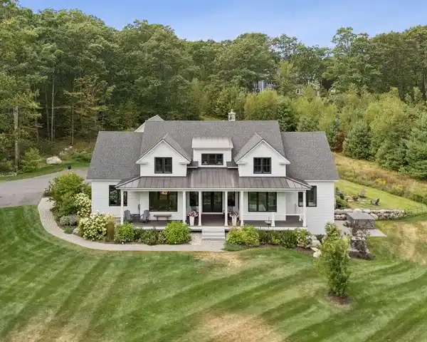 EXCEPTIONAL EXTENDED CAPE COD STYLE HOME