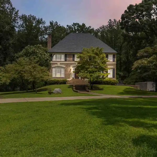 BEAUTIFULLY CRAFTED THREE-STORY ALL-BRICK HOME