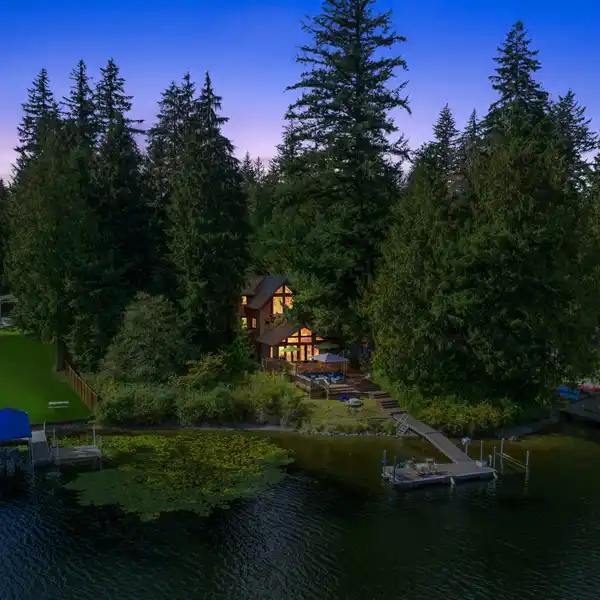 INCREDIBLE CUSTOM CRAFTSMAN PROPERTY ON FLOWING LAKE