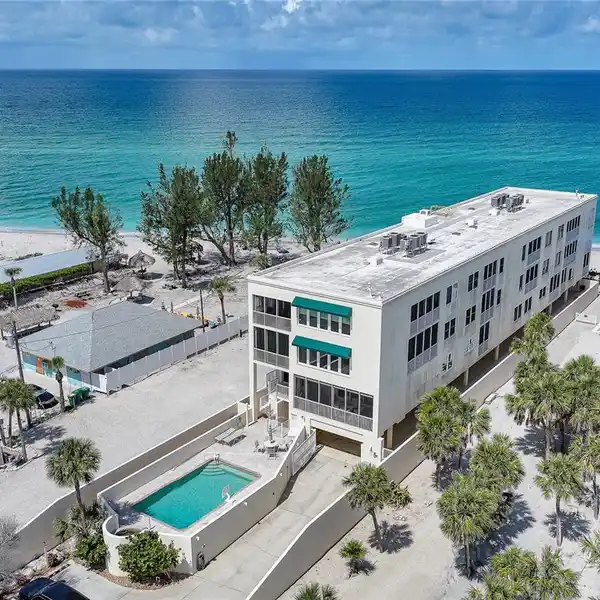 SECURE GATED CONDO STEPS FROM BEACH