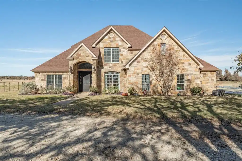 Expansive Ranch Retreat with Barn, Pond, and Privacy