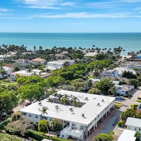 ARTFULLY REDESIGNED CONDOMINIUM STEPS TO THE GULF
