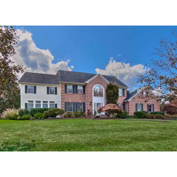 EXQUISITE SIX BEDROOM CENTER HALL COLONIAL