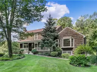 Beautiful Colonial on Nearly Three Park-like Acres