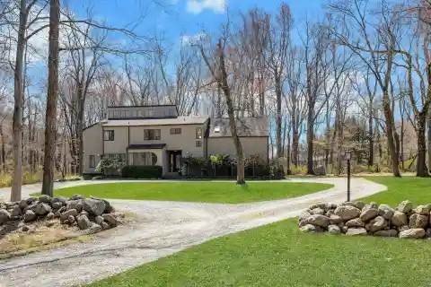 Contemporary Country Colonial on over Nine Acres