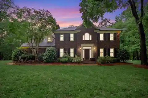Charming Brick Home on a Wooded Lot