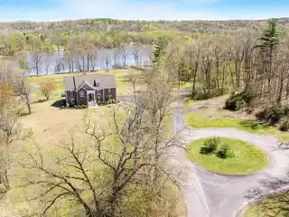 Comfortable Riverfront Living on over Three Acres