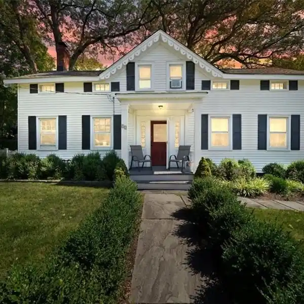 UPDATED VINTAGE COLONIAL NESTLED ON ALMOST TWO ACRES
