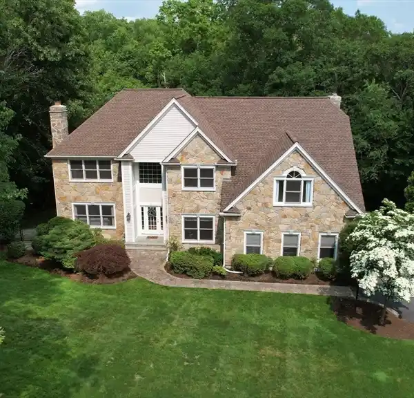 ELEVATED ELEGANCE IN DISTINGUISHED WOODED ENCLAVE