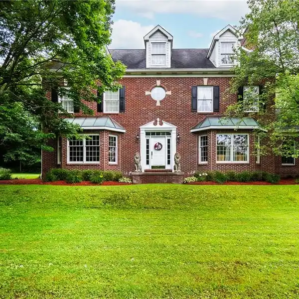 MASTERFULLY-DESIGNED AND CRAFTED BRICK RESIDENCE