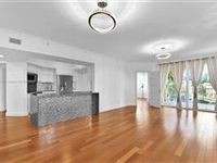 BRIGHT AND SPACIOUS CONDO MINUTES TO THE BEACH